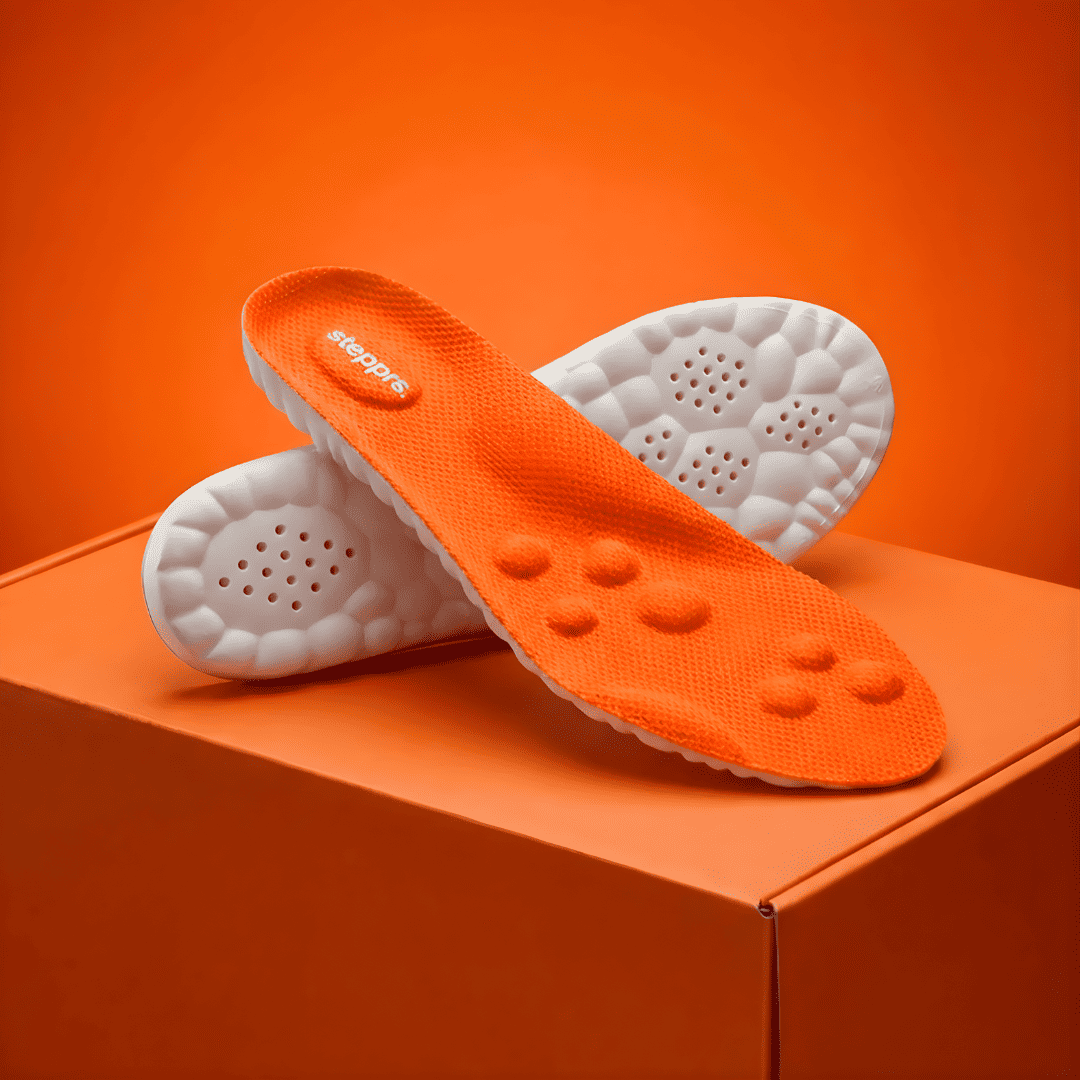 FLOATR Cloud Insoles on orange box